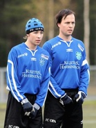 Mikko Rantala ja Timo Heikkilä muurissa.